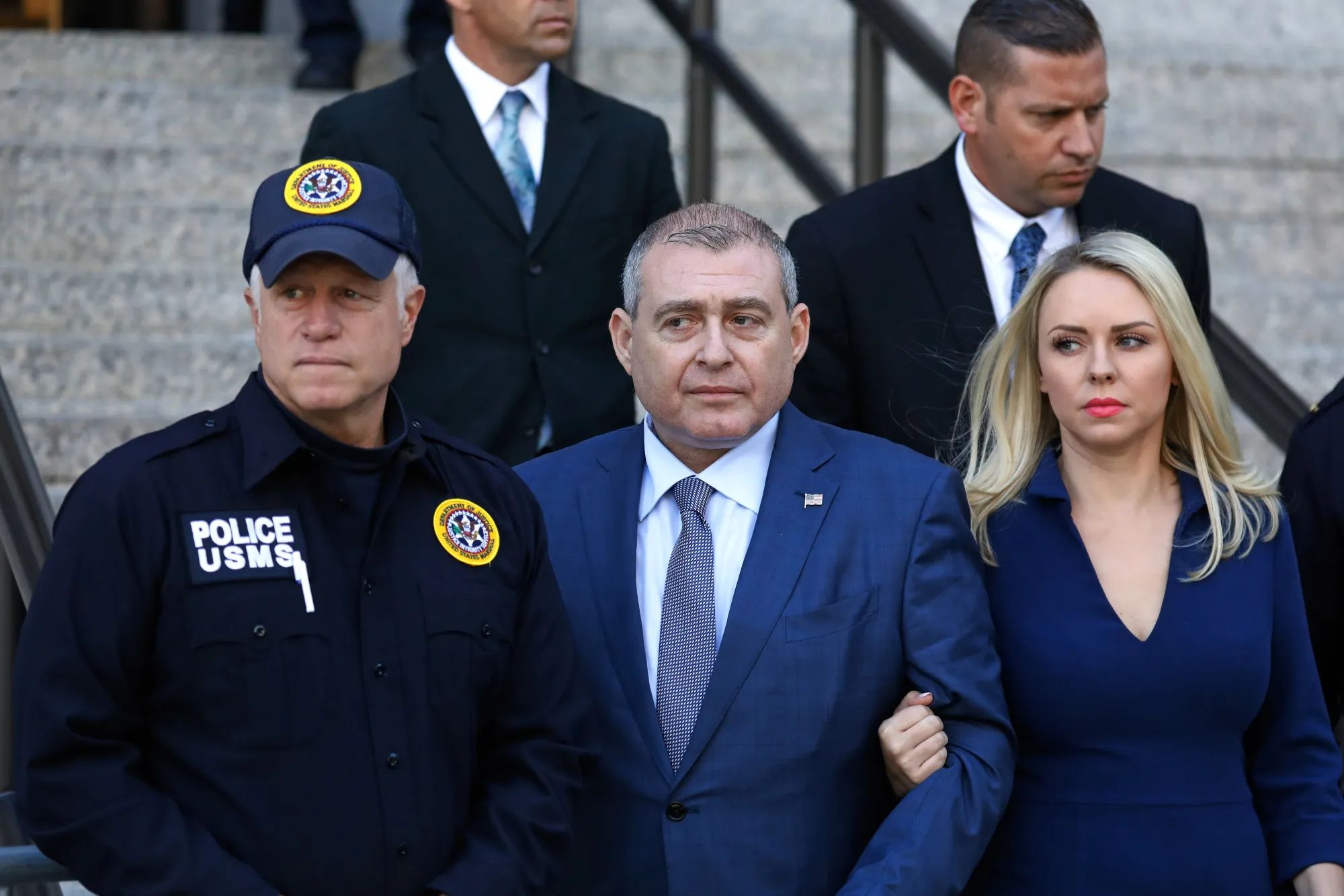 Lev Parnas, center, exits federal court in New York on Oct. 23, 2019.