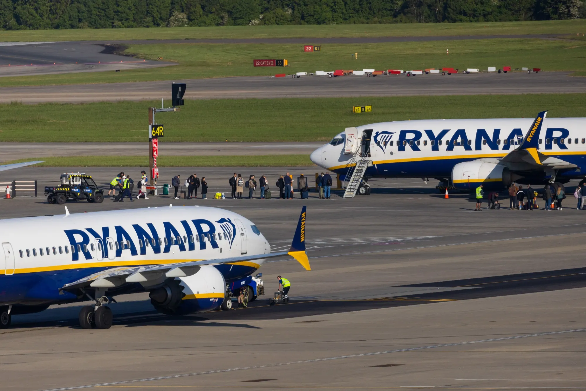 Passengers board a Ryanair&nbsp;aircraft at London Stansted Airport in Stansted, UK.