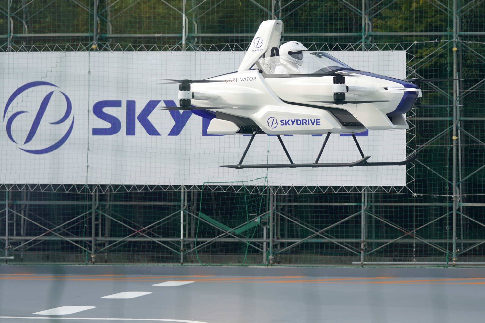 Japan's 'Flying Car' Gets Off Ground, With A Person Aboard - Bloomberg