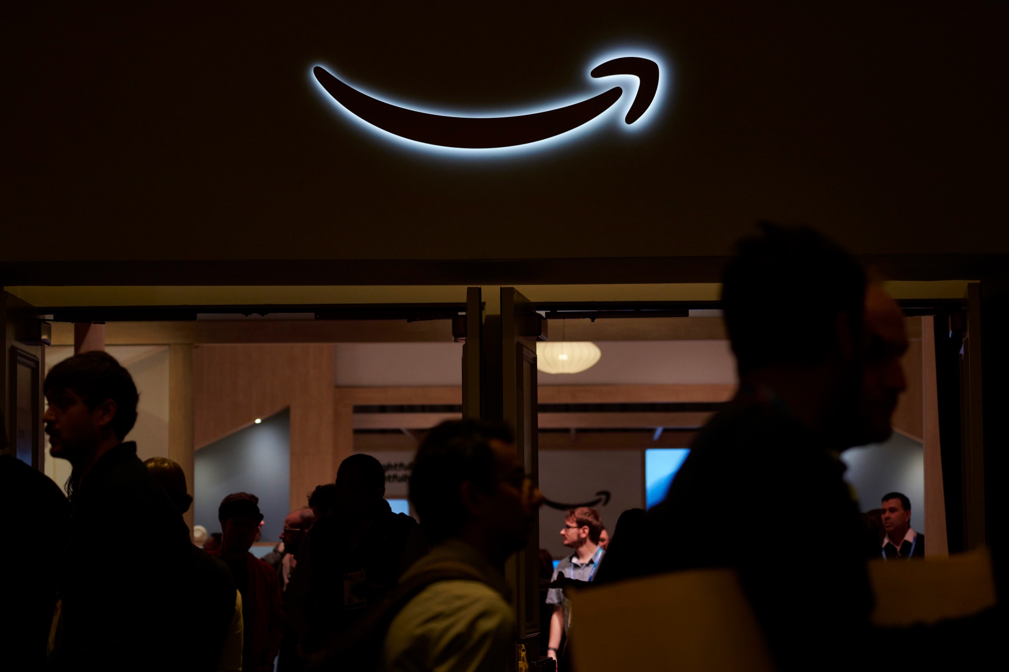 Amazon signage during the 2026 CES event in Las Vegas, Nevada, US, on Wednesday, Jan. 7, 2026. At CES, the biggest names in tech will make the case for artificial intelligence for a target audience of investors, corporate clients and, perhaps just as importantly, ordinary shoppers who have yet to be fully sold on the idea of AI-infused gadgets.