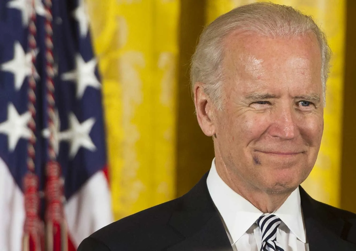 US Vice President Joe Biden attends a reception for the 25th anniversary of the Americans with Disabilities Act (ADA) in the East Room of the White House in Washington, DC, July 20, 2015. AFP PHOTO / SAUL LOEB (Photo credit should read SAUL LOEB/AFP/Getty Images)
