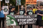 Demonstrators protest outside a closed Starbucks in Seattle, Washington, on July 16, 2022.