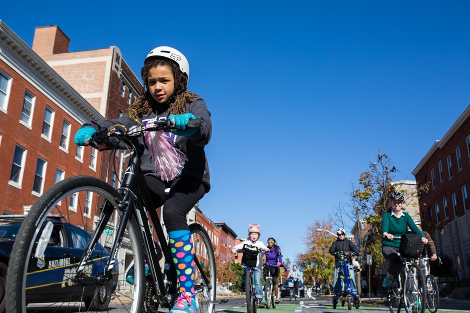 Cyclists take an inaugural spin on Baltimore's new protected &quot;cycle track.&quot; 