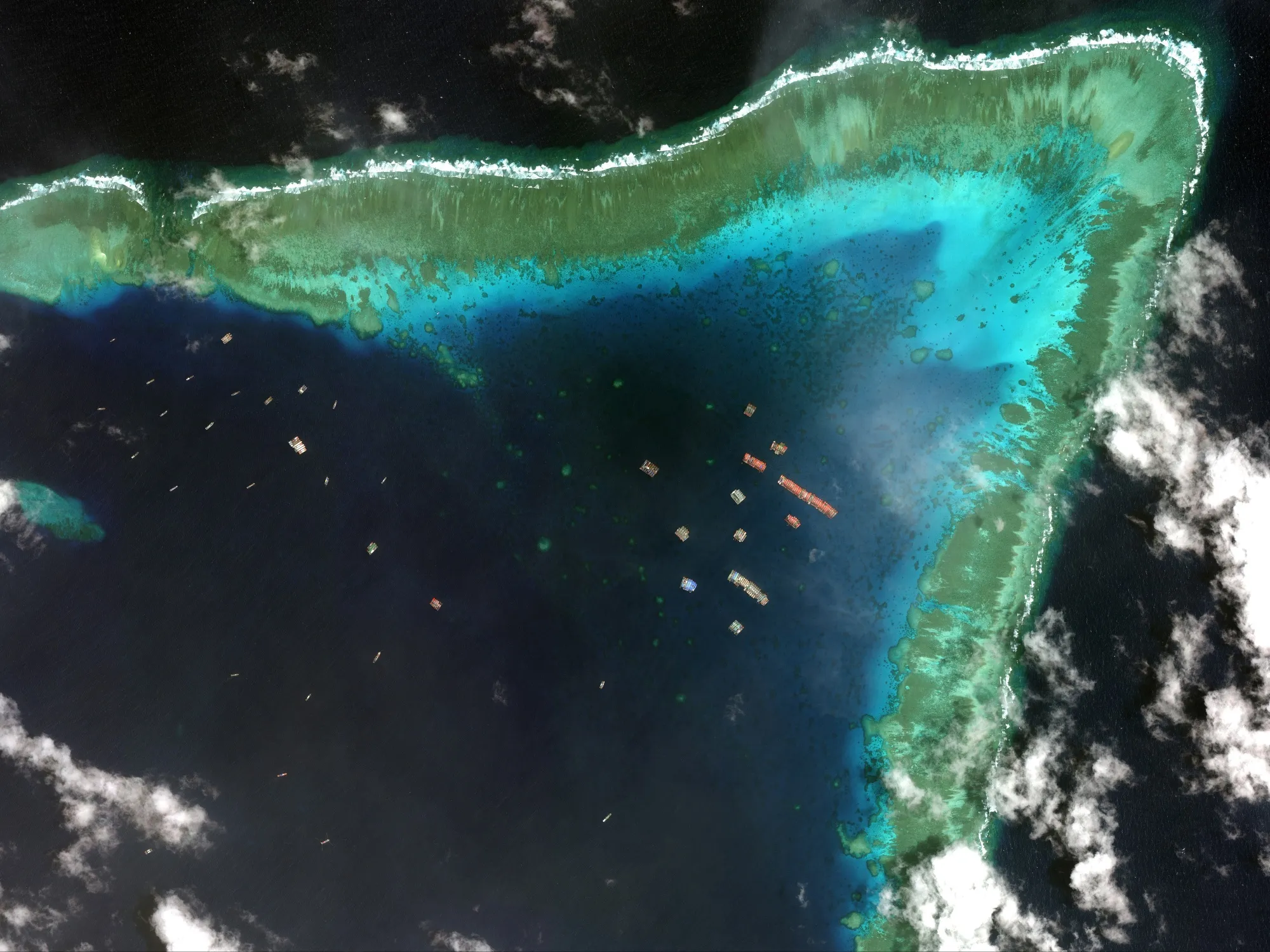 Chinese vessels in the Whitsun Reef in the disputed South China Sea, on March 23.