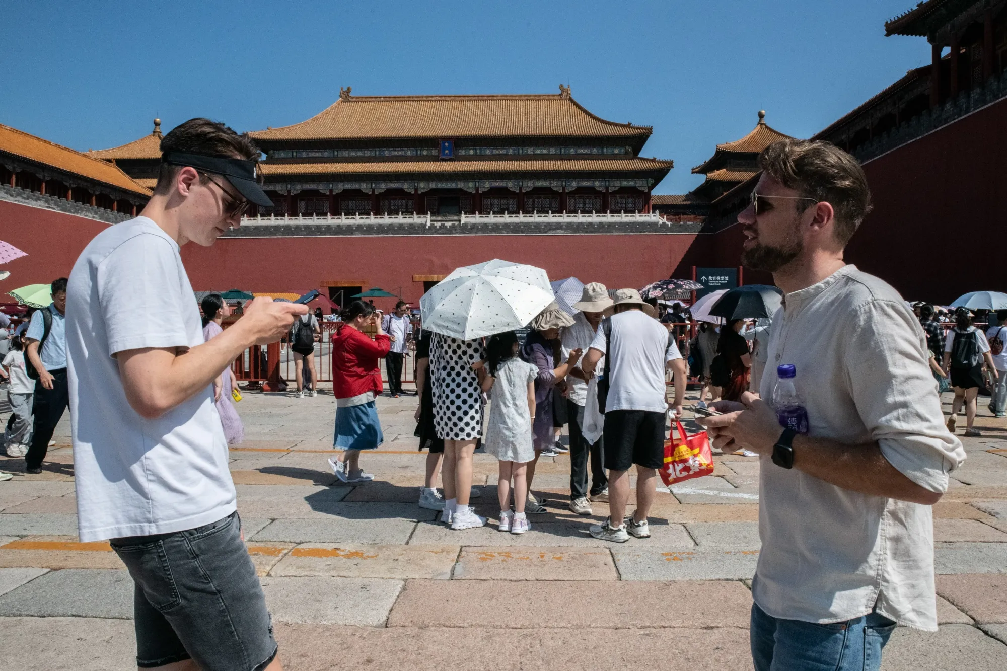 Tourists at the Forbidden City in Beijing.