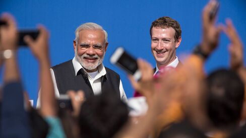 Narendra Modi, India's prime minister, left, and Mark Zuckerberg, chief executive officer of Facebook Inc., at the conclusion of a town hall meeting at Facebook headquarters in Menlo Park, California, on Sept. 27, 2015. P
