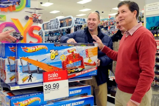 Target CEO Gregg Steinhafel checks out Black Friday sale items on Nov. 22, 2012, in Bloomington, Minn.