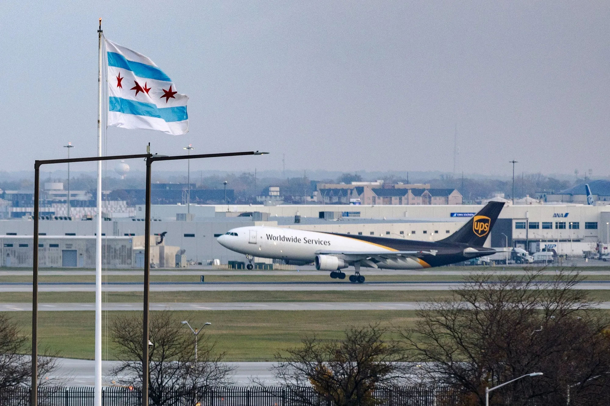 A UPS cargo plane lands at O’Hare International Airport in Chicago on Friday, Nov. 7, 2025.