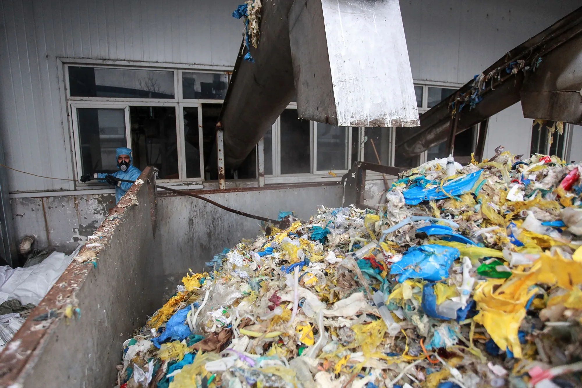 Disposal of medical waste at a medical waste treatment plant in Yangzhou, Jiangsu province, Jan. 28.