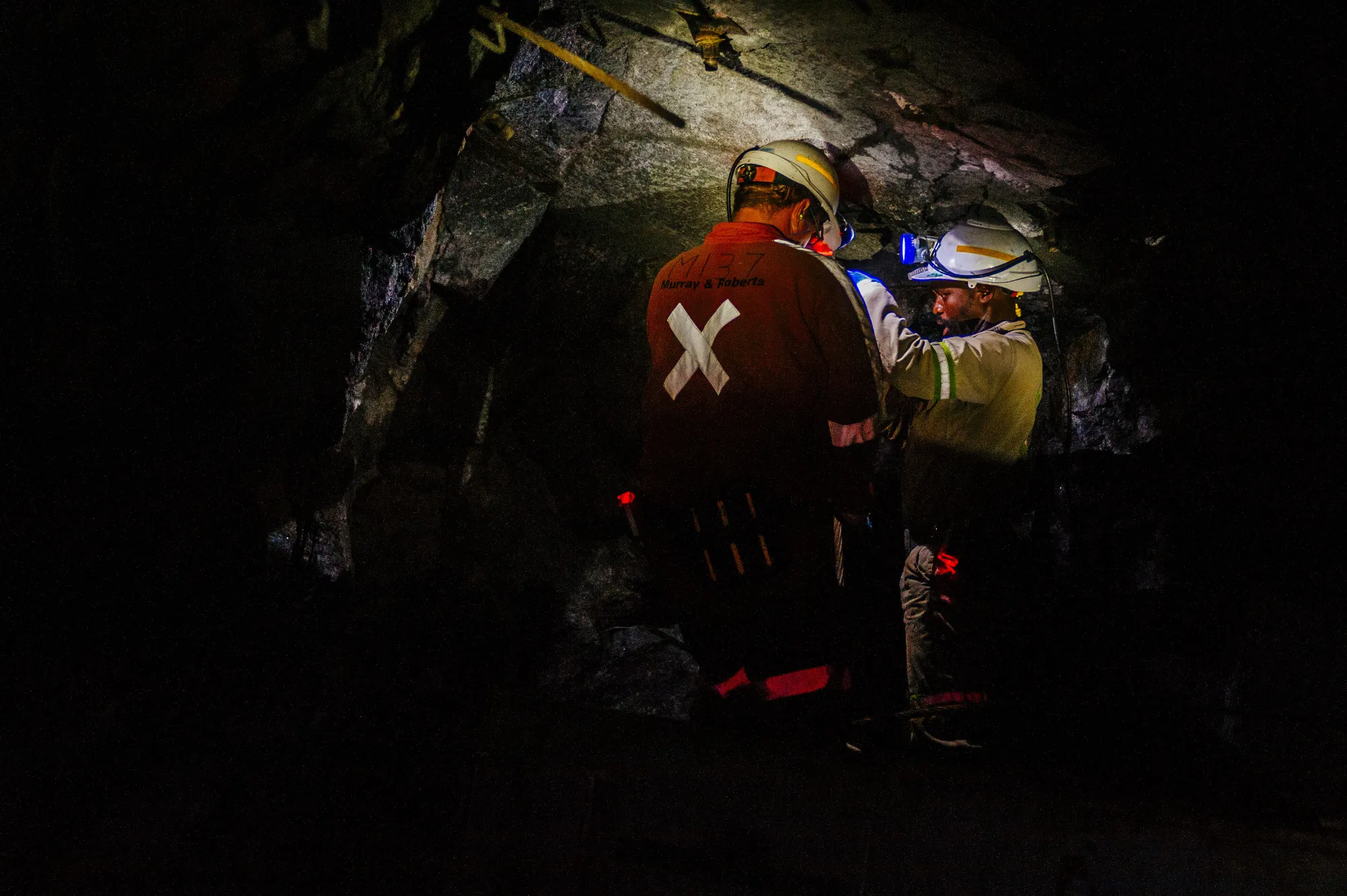Miners stand inside a mine shaft in Mpumalanga, South Africa.