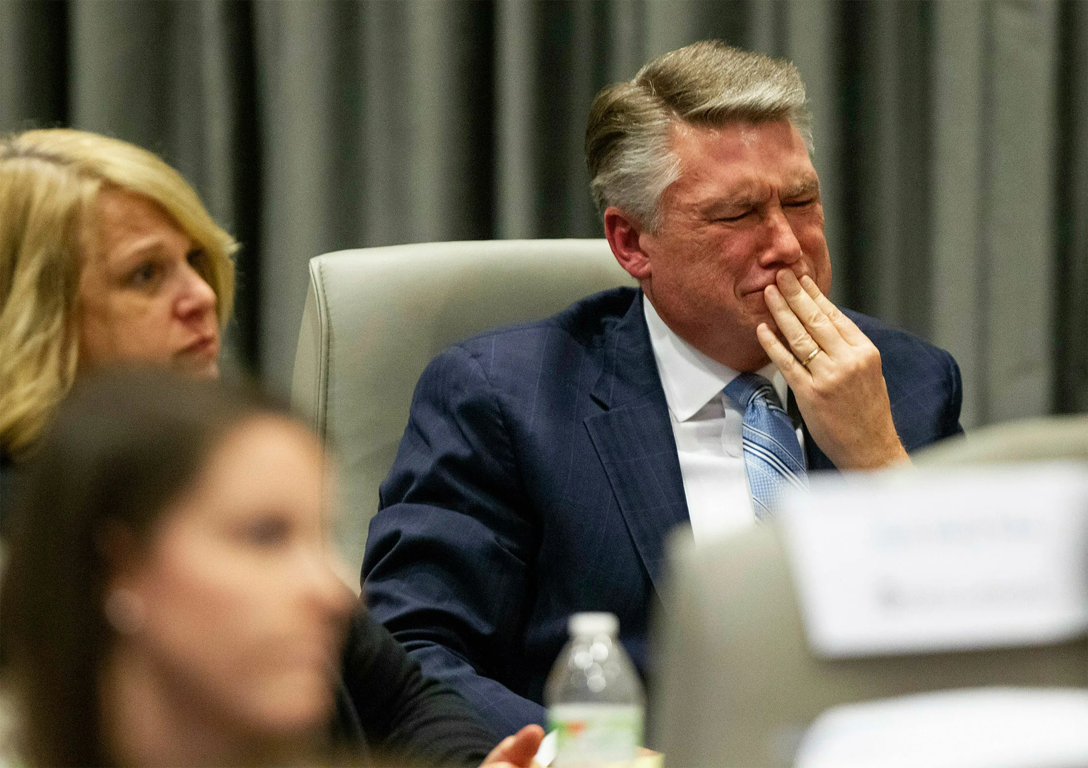 Mark Harris fights back tears at the conclusion of his son’s testimony on Feb. 20.