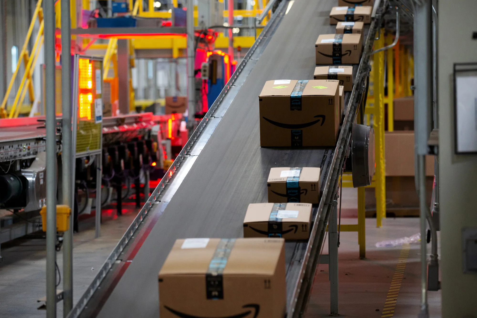 Packages move along a conveyor at the Amazon.com Inc. fulfillment center in Robbinsville, New Jersey, U.S., on Thursday, June 7, 2018.