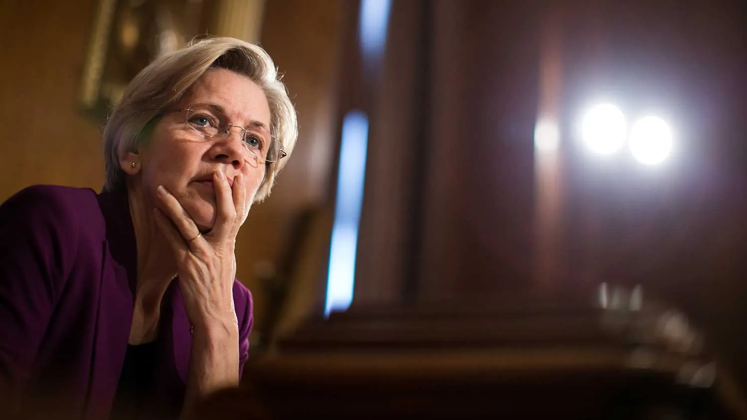 U.S. Sen. Elizabeth Warren (D-MA) listens to testimony from witnesses during a Senate Banking, Housing and Urban Affairs Committee hearing on 'Mitigating Systemic Risk Through Wall Street Reforms,' on Capitol Hill, July 11, 2013 in Washington, DC.
