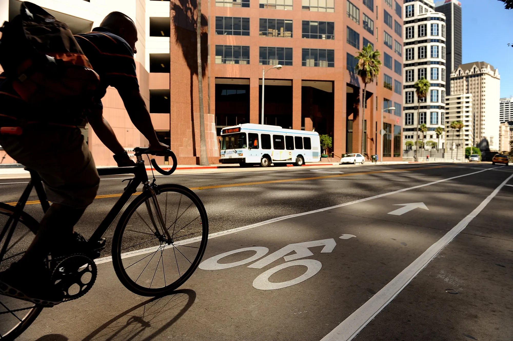 A bicyclist in downtown Los Angeles. Despite its agreeable climate, LA isn’t&nbsp;known as a welcoming city for bike commuters.