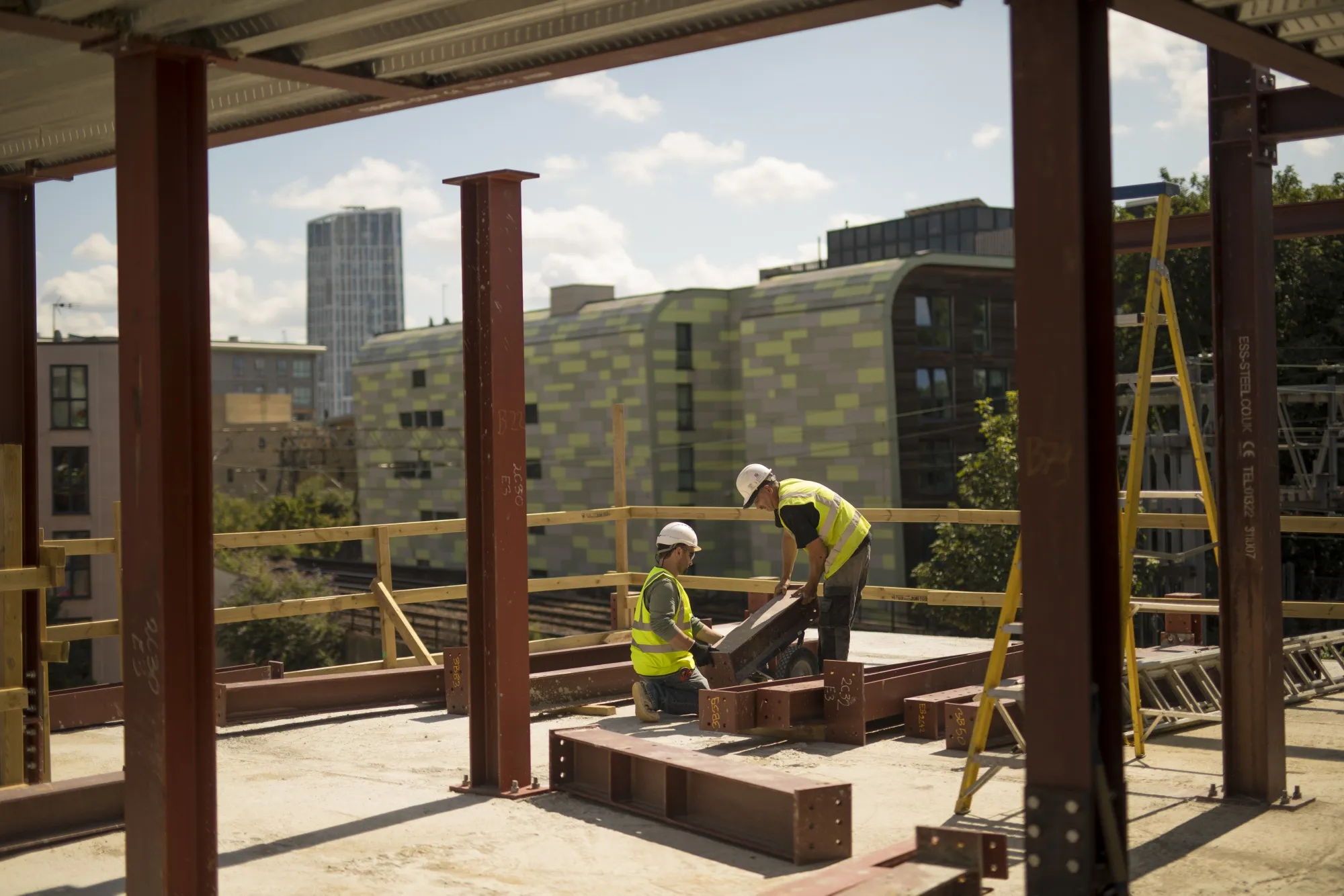 Construction workers on a residential site in London, July 29.