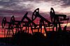 Oil pumping jacks, also known as "nodding donkeys", in an oilfield near Neftekamsk, in the Republic of Bashkortostan, Russia.