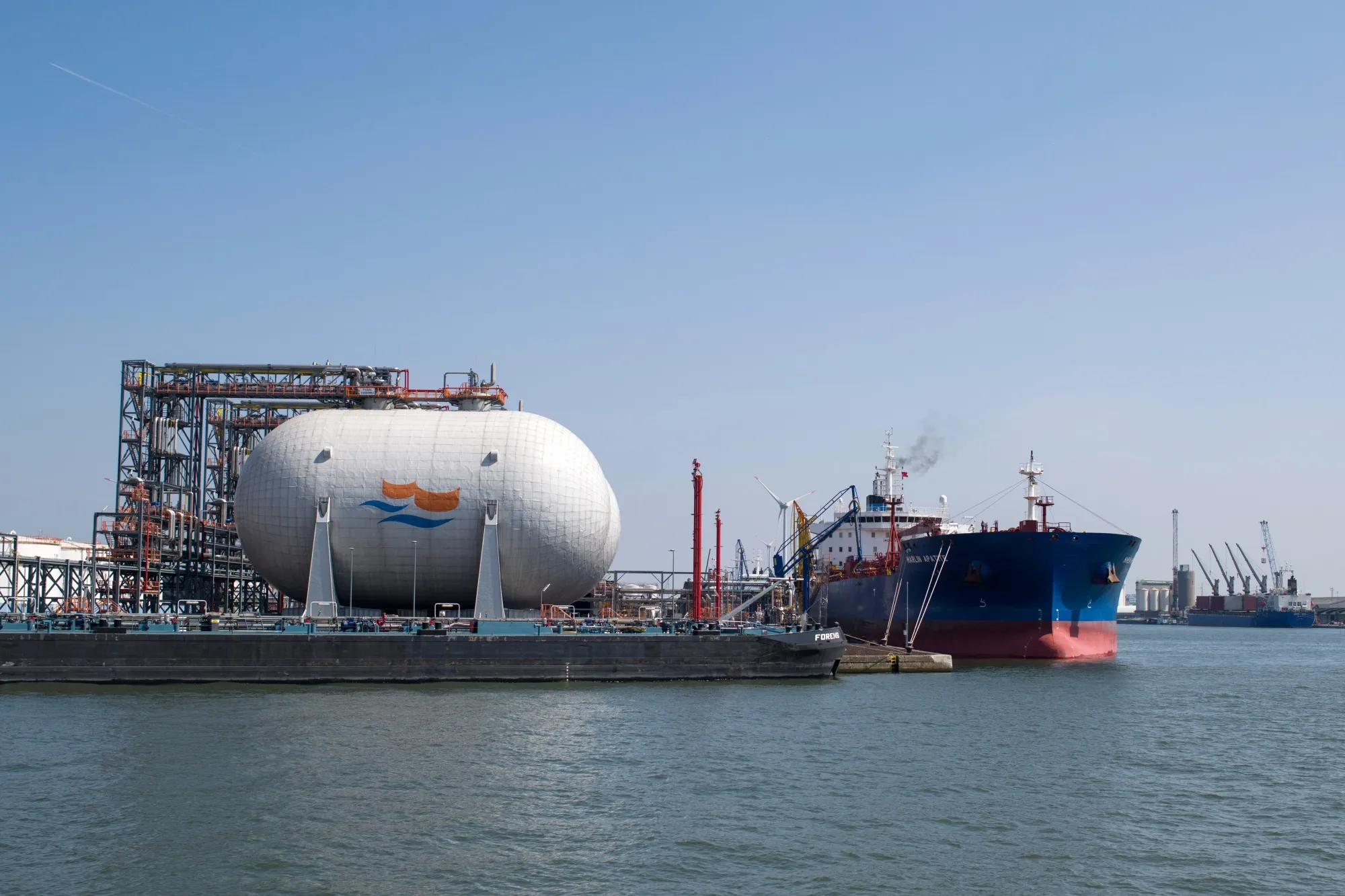 A tanker docked at&nbsp;liquid petroleum gas-ethane storage tanks.