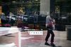 The Tesla Inc. logo is displayed on a Model S electric vehicle sitting in the window of one of the company's showrooms in Beijing, China, on Friday, May 10, 2019. Beijing has vowed to retaliate after U.S. President Donald Trump followed through with his threat to raise tariffs Friday on $200 billion of Chinese imports to 25% from 10% percent.