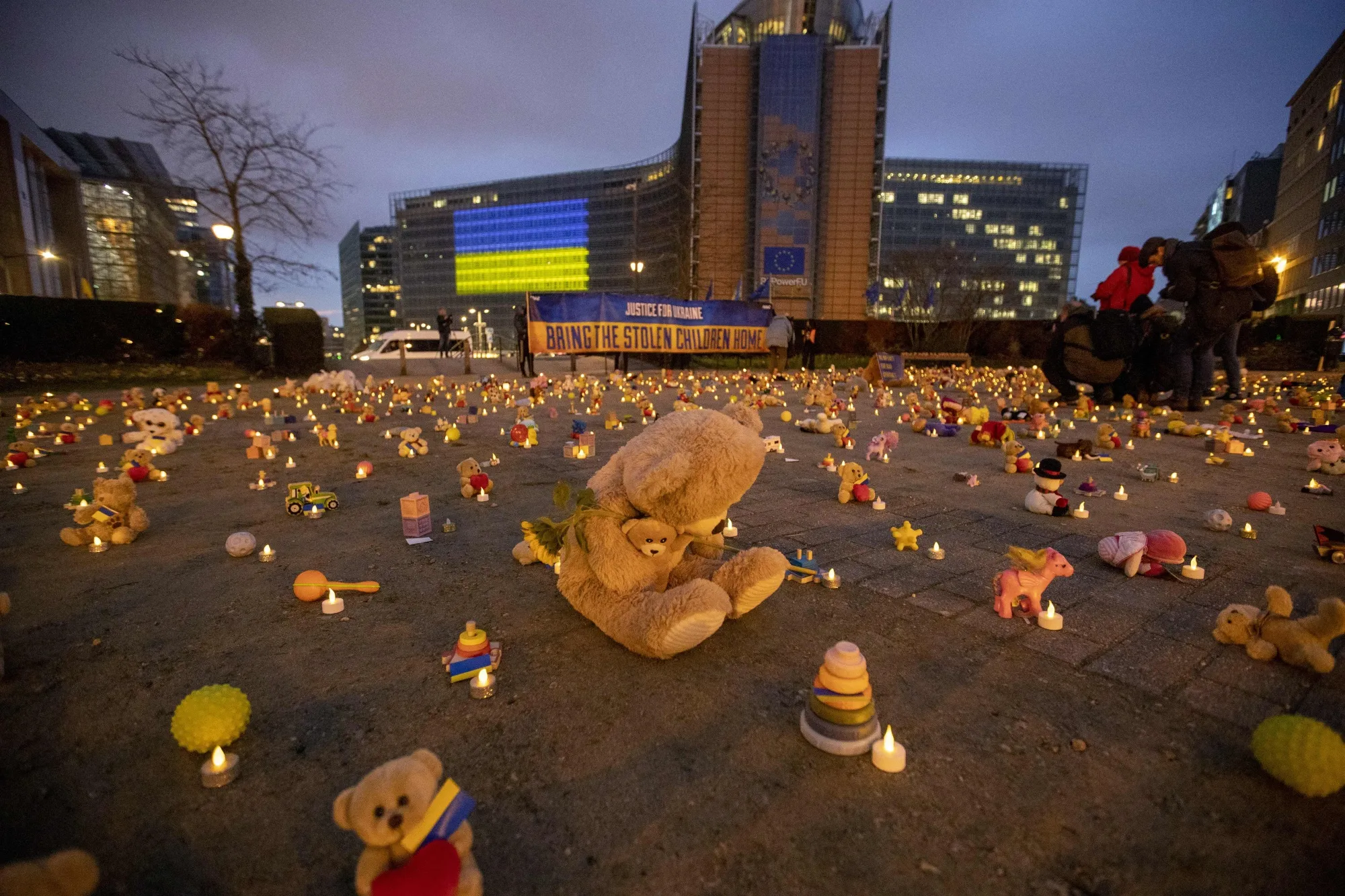 Toys representing children abducted during the war in Ukraine in Brussels on Feb.&nbsp;23.
