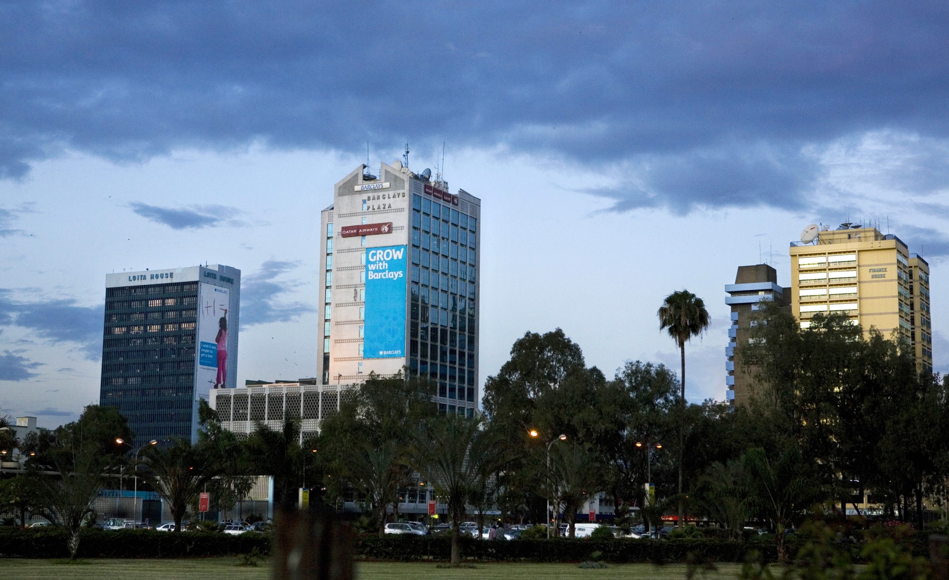Barclays Plaza, center, the main offices for Barclays Bank, stand behind Central Park in Nairobi, Kenya.