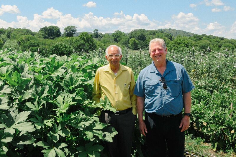 Climate scientist Rattan Lal with former U.S. Vice President Al Gore on his farm in Carthage, Tennessee.