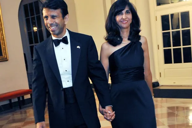 Governor of Louisiana Bobby Jindal and his wife Supriya Jindal arrive for the State Dinner for Prime Minister Manmohan Singh at the White House.
