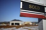 A "For Sale" sign outside a house under construction at the Norton Commons subdivision in Louisville, Kentucky.