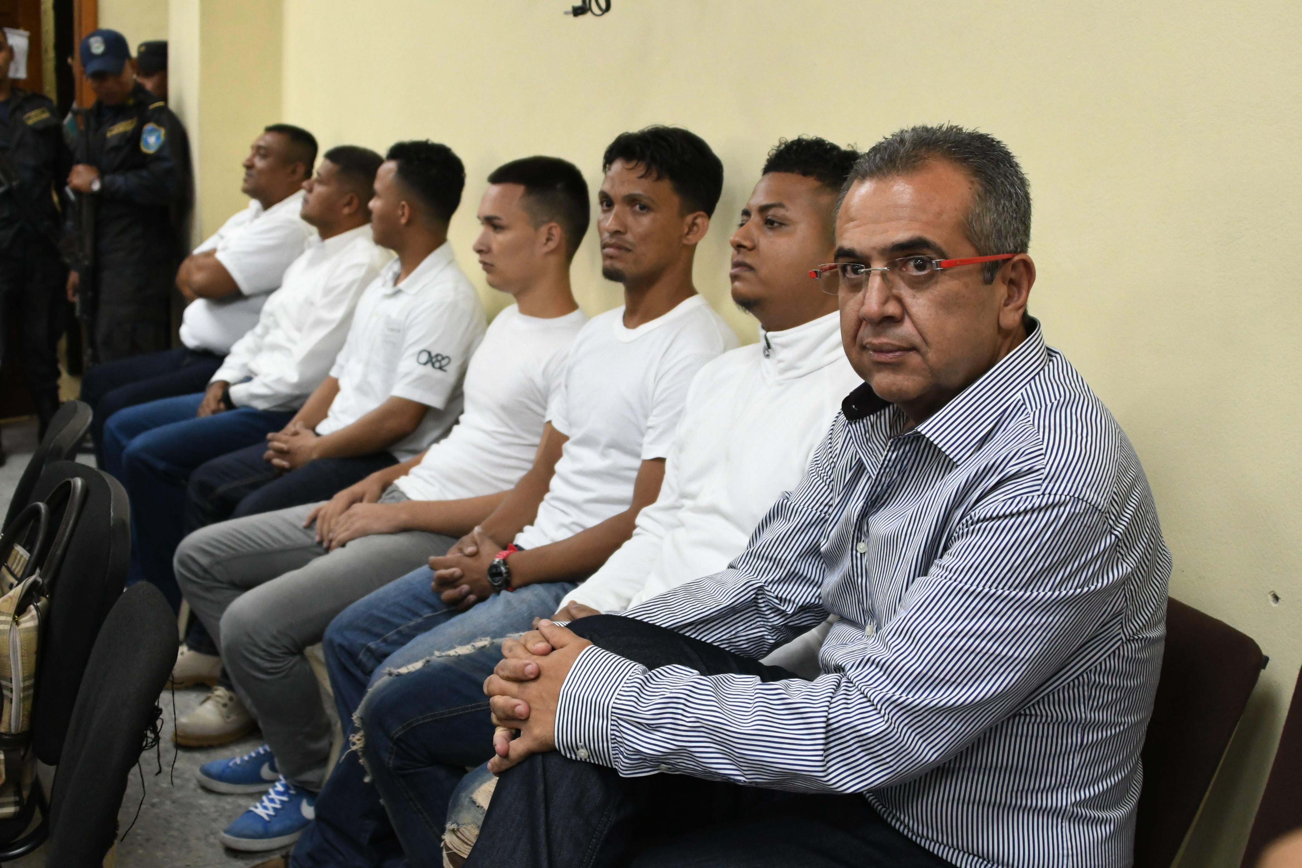 Sergio Rodriguez (right), along with six others who were accused of murdering&nbsp;indigenous environmental activist Berta Cáceres, sits in a Tegucigalpa, Honduras, courtroom on Sept.&nbsp;17, 2018.