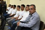 Sergio Rodriguez (right), along with six others who were accused of murdering indigenous environmental activist Berta Cáceres, sits in a Tegucigalpa, Honduras, courtroom on Sept. 17, 2018.