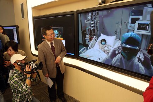 China Bird-Flu Death Toll Rises to 13 as H7N9 Virus Spreads