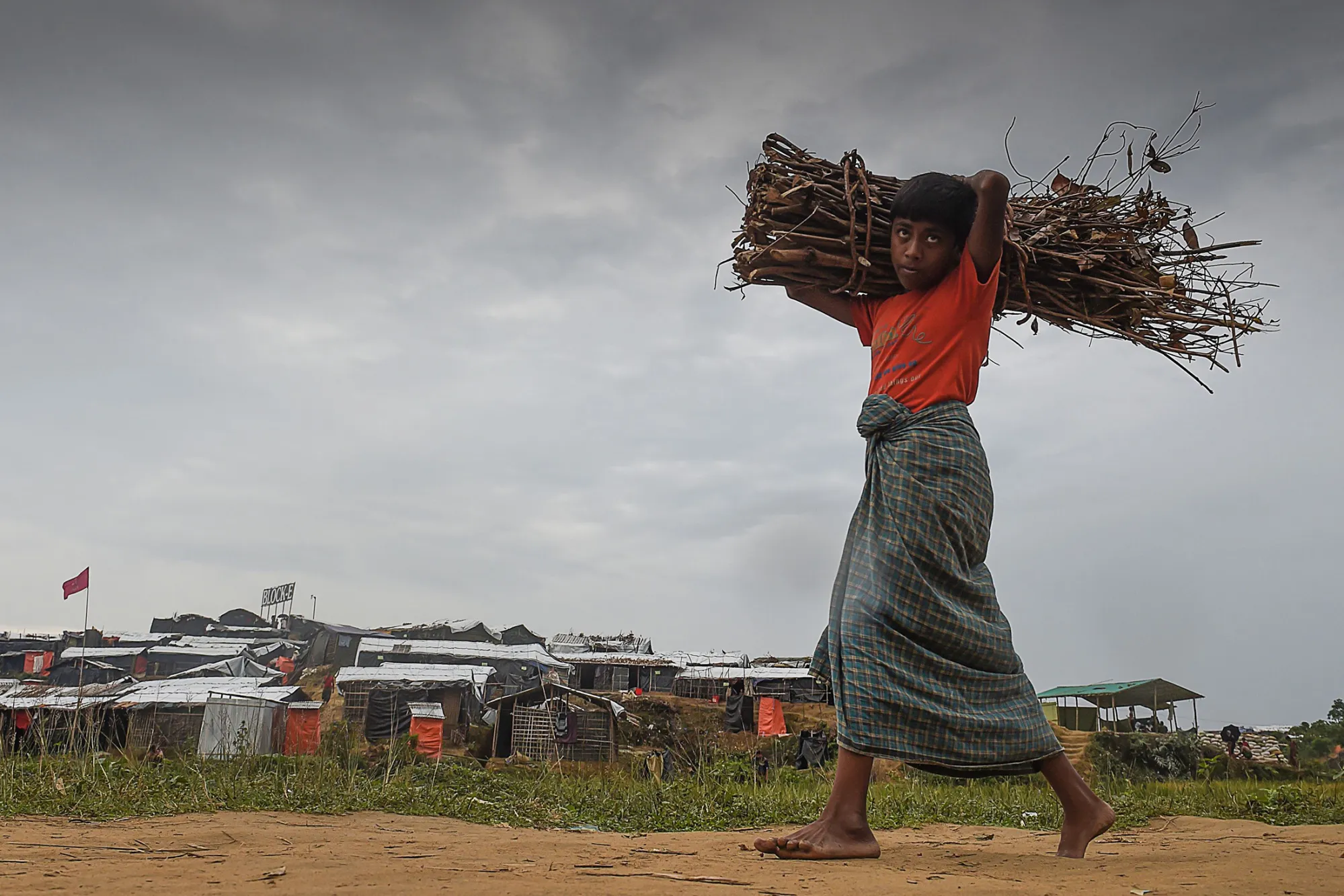 A Rohingya refugee child walks back to his house&nbsp;at Thankhali refugee camp in the Bangladeshi district of Ukhia on Nov. 17.