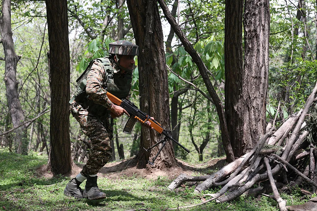 Special commandos search an area in the forest area of Pahalgam, Jammu and Kashmir, India, on April 26.