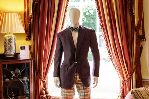 A lilac linen sports coat and wool check trousers featured in the "Savile Row and America" exhibition.