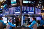 Trading On The Floor Of The NYSE While Stocks Fluctuate As Utilities Offset Retail Slump