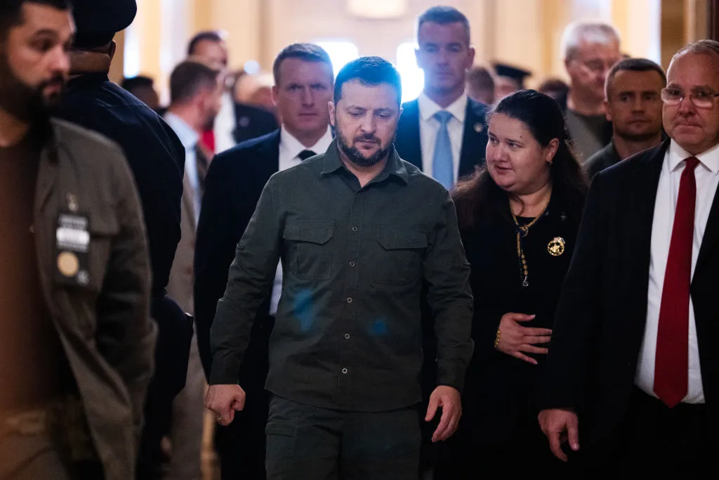 Volodymyr Zelenskiy and Oksana Markarova, right.