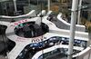 Employees work at the Tokyo Stock Exchange in Tokyo, Japan, on Friday, May 24, 2013. Japanese stocks swung between gains and losses, after yesterday dropping the most since the March 2011 disaster, as utilities and airlines advanced, while commodity producers and paper makers declined.