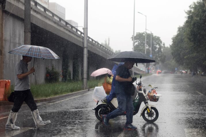 Typhoon Dolphin Brings Heavy Rain To Beijing