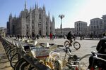 Bikes for rent parked near Duomo Cathedral in Milan. The province is looking to complete a network of protected cycling lanes by 2035.