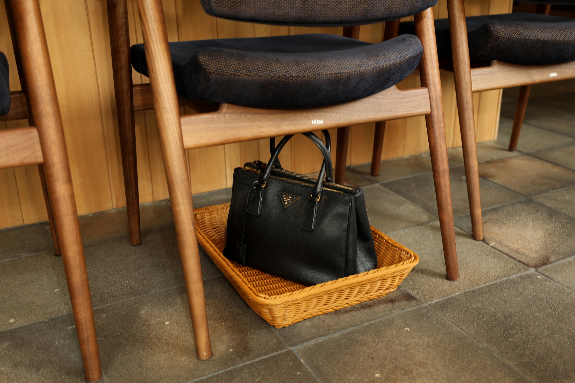 Luxury Purse Stools Are Grabbing More Real Estate in Restaurants - Bloomberg