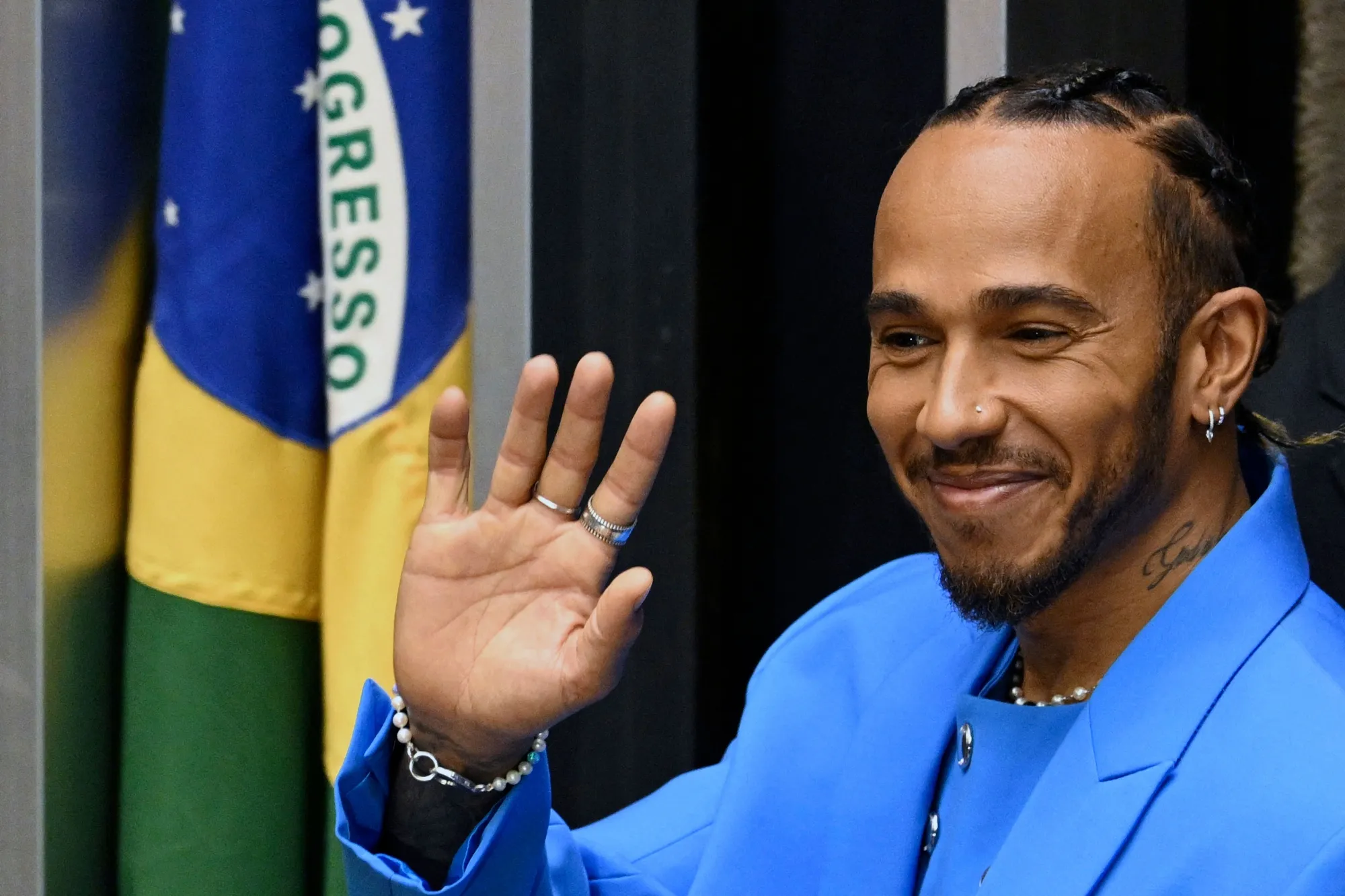 Lewis Hamilton waves after being awarded Honorary Brazilian Citizenship in Brasilia, Brazil on November 7.&nbsp;