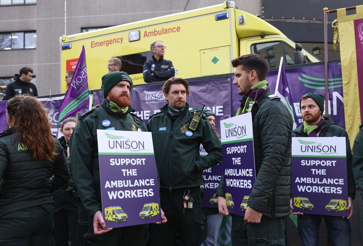 Striking hospital workers turn up at RMT rally in show of support for rail  staff