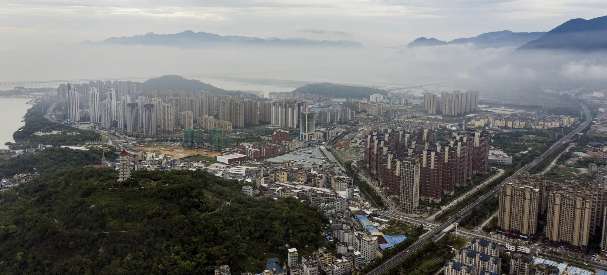 Buildings stand in Ningde, Fujian province, China, on June 3.