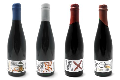 A selection of bottles from Mikkeller’s rare “Small Brew Series!” featuring artwork by Keith Shore.