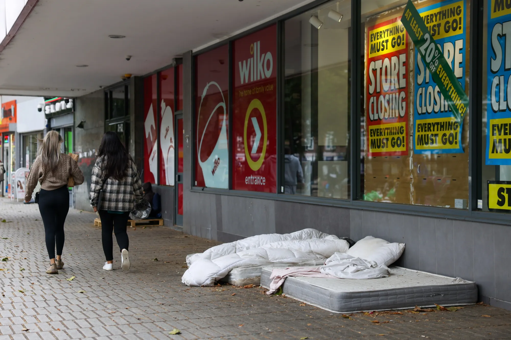 Mattresses for homeless people outside a shop.&nbsp;