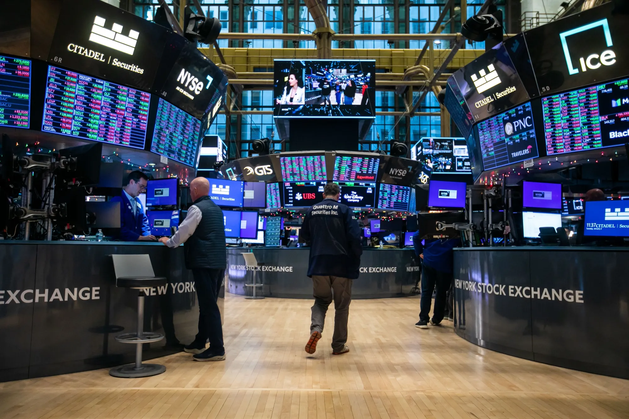 Traders work on the floor of the New York Stock Exchange (NYSE) in New York.