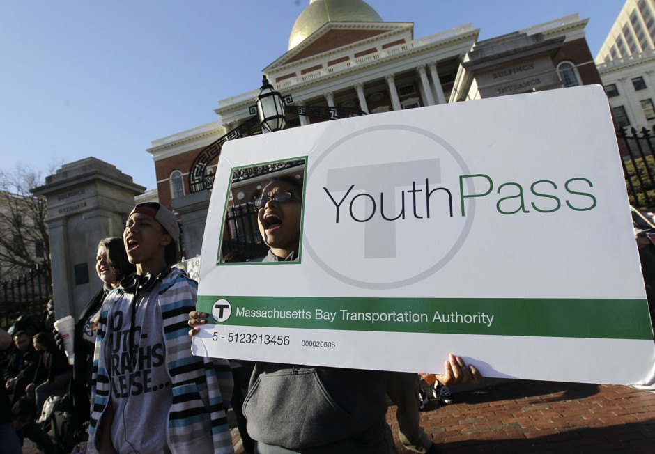 In this Tuesday, April 3, 2012 photo, protesters demonstrate against MBTA in front of the Statehouse in Boston.