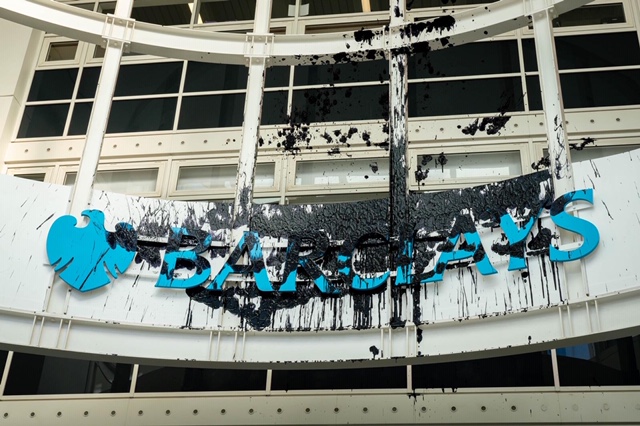 The Barclays logo sits defaced following an Extinction Rebellion protest at the office&nbsp;in Northampton, on Feb. 26.