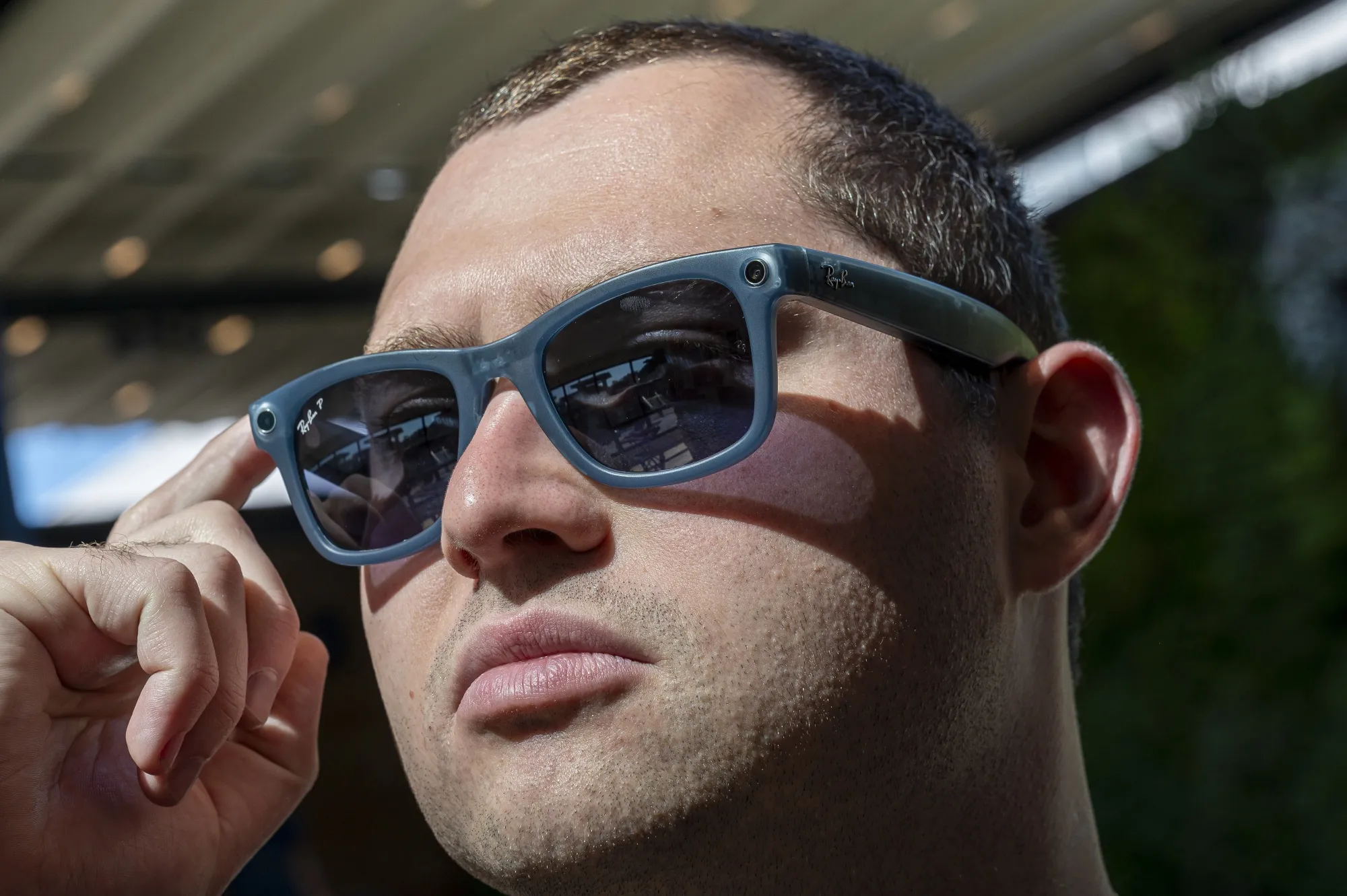 An attendee wears Ray-Ban Meta Smart Glasses.