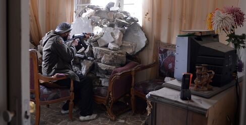 Assad Says Syria Ready to Negotiate as U.K. Offers Aid to Rebels