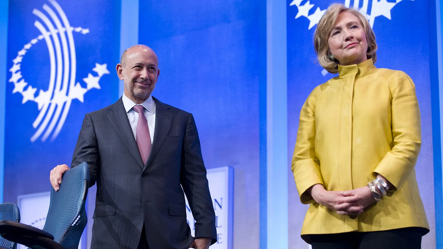 Lloyd Blankfein, chairman and CEO of Goldman Sachs, stands on stage with former Secretary of State Hillary Clinton during the 2014 Clinton Global Initiative annual meeting in New York on Sept. 24, 2014.
